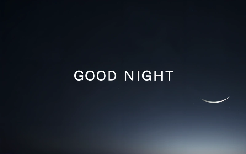 A black and white photo of a crescent moon and the words good night written in white on a black background with a crescent moon in the middle, david rudnick, a minimalist painting, minimalism